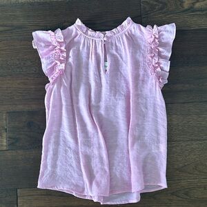 Women’s pink blouse with ruffle sleeves